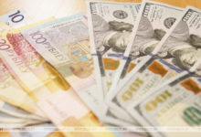 Photo of Доллар и российский рубль на торгах 4 октября подешевели, евро подорожал